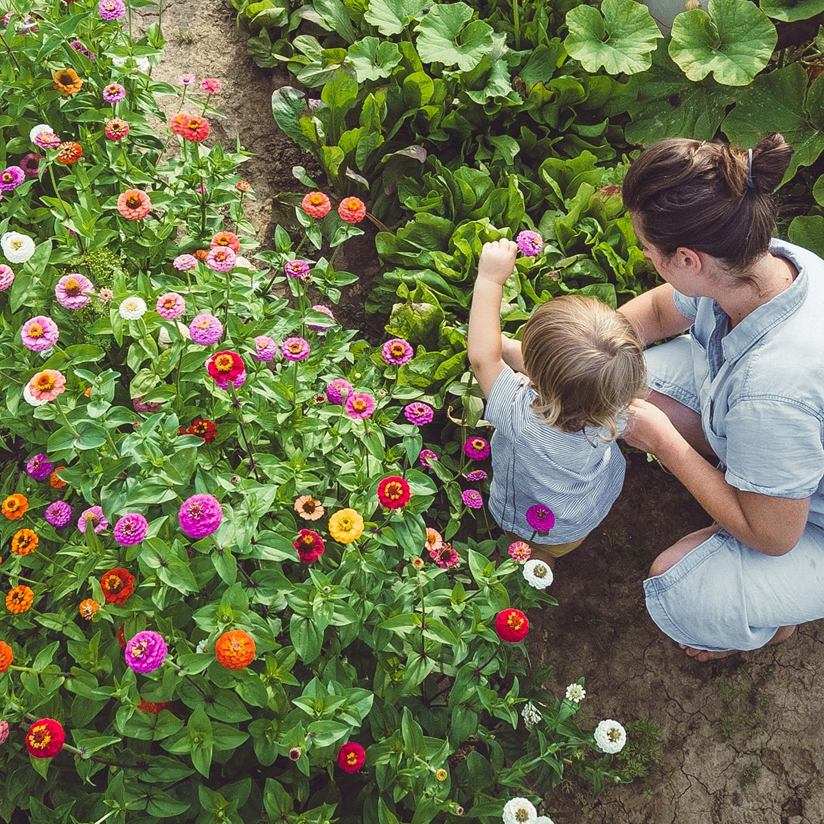 Woman and child in Garden with flowers 