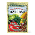 Package of tomato and vegetable plant food with vegetables on a white background