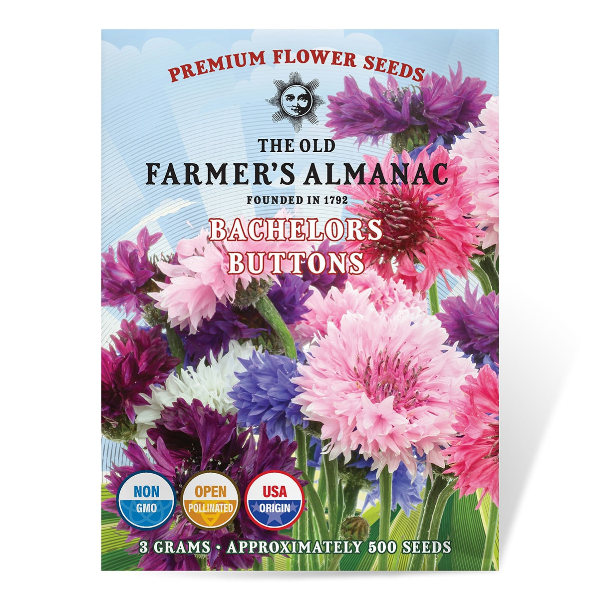 Seed packet for 'Bachelors Buttons' from The Old Farmer's Almanac with colorful flowers on a blue background.